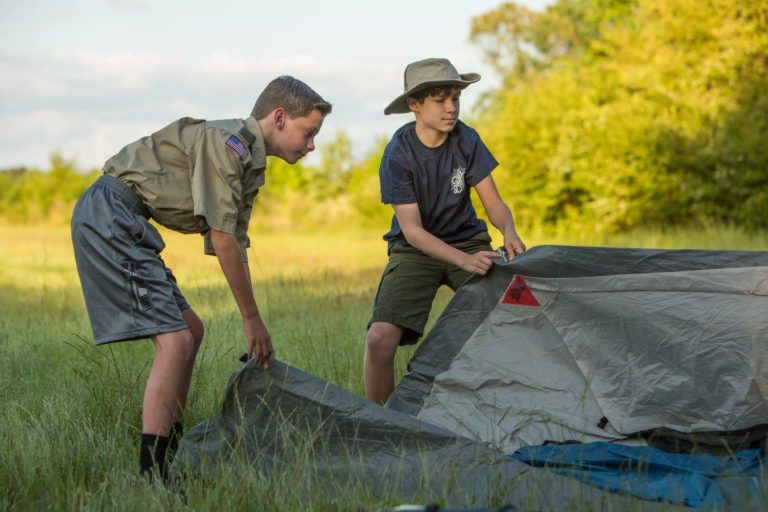 scouts setting up a tent