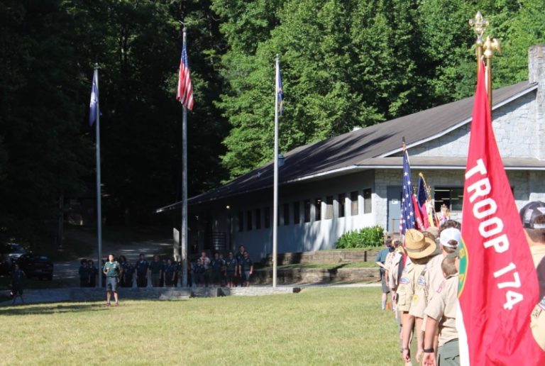 scouts assembled in meadow